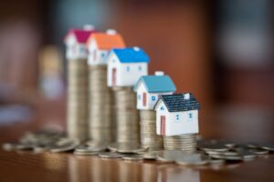 Foundation Repair Increase Costs - houses on a graph going up - Atlantic Foundation & Repair